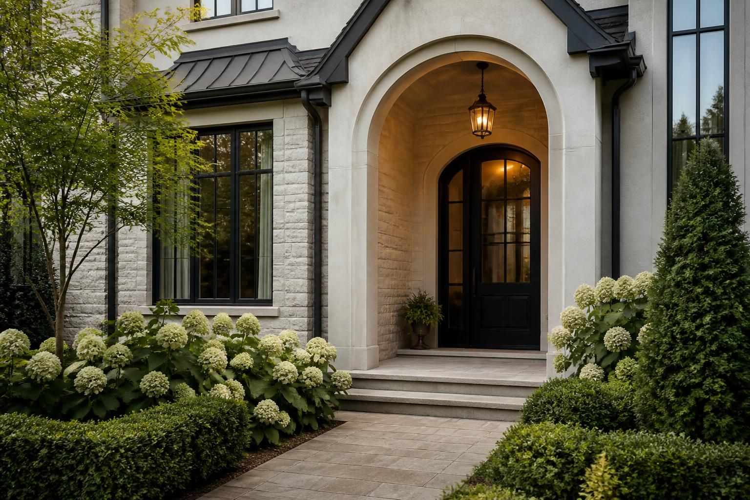 Refined home exterior with landscaped entry and balanced composition.
